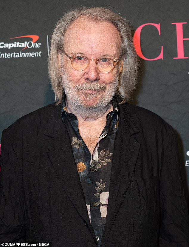 While Benny, 78, also put on a smart display in a long black coat and leather boots, but added a nod to Abba's 70s heydey by teaming a floral shirt underneath