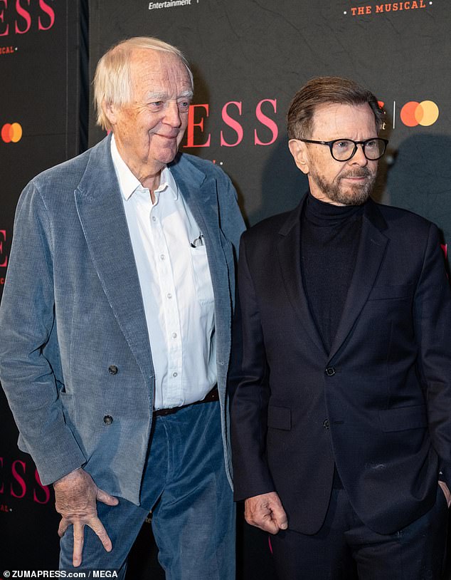 Björn, 80, cut a dapper figure as he posed alongside his bandmate in a fitted black suit with a coordinating turtleneck underneath