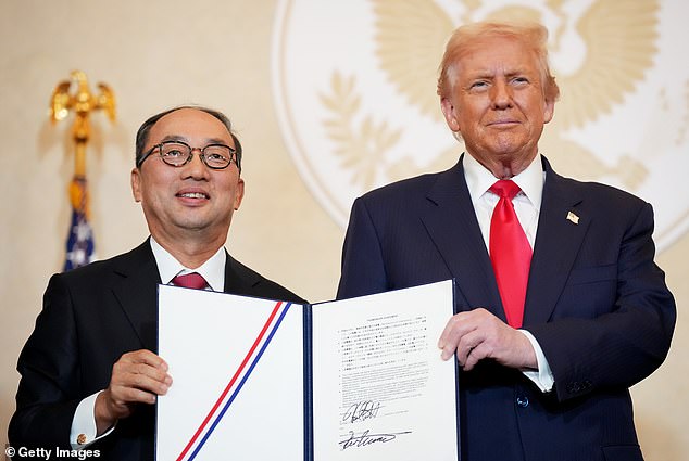 The President meets with Mitsubishi Electric chief executive Kei Uruma at the US Ambassador's Residence in Tokyo on October 28
