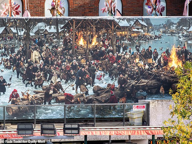 Londoners are baffled as a huge AI-generated Christmas mural appears over Côte Brasserie in Kingston - so, can you see what's wrong with it?