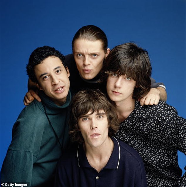Reni, Mani, Ian Brown and John Squire, members of The Stone Roses posed in a London studio in July 1990