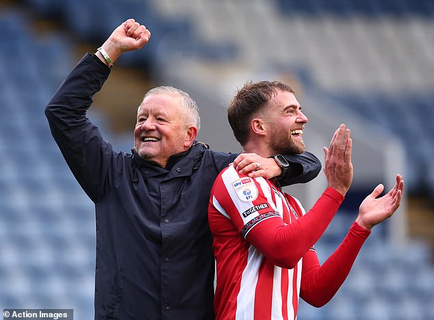 Chris Wilder and Patrick Bamford showed they have buried the hatchet as they danced to an ironic version of an x-rated chant