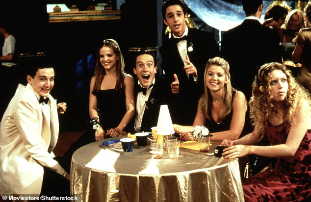 Reid, pictured second R, is memorably known for her role in the high school film American Pie