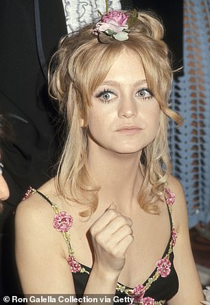 She has credited her youthful appearance and stunning figure with a rigorous skin routine, eating healthy and exercising daily. She's seen in 1971