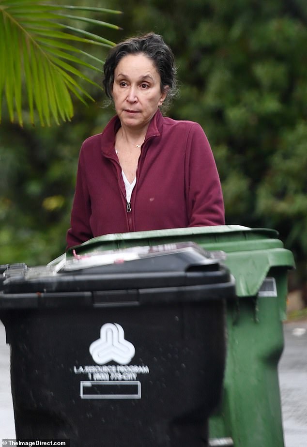 Sporting a burgundy fleece jacket and gray sweatpants, her laid-back look was a far cry from the red-carpet glam she rocked during her early career