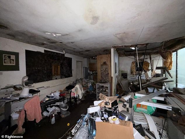 One of the rooms in the three-bedroom North London property, which is overcrowded with rubbish and hoarded goods