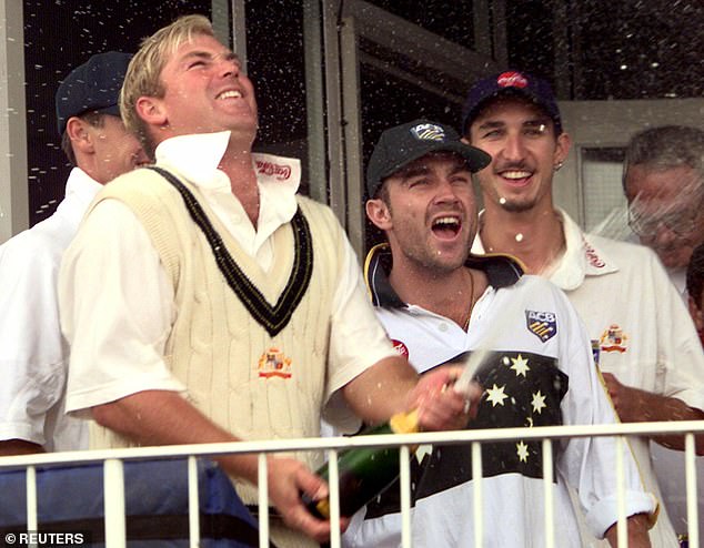 Gillespie (right) celebrates with Michael Slater (centre) and Shane Warne (left) after winning the fourth Test in 1997 by an innings and 61 runs at Headingley