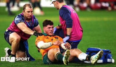 Carlo Tizzano being tended to by medics