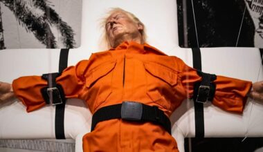 'Saint or Sinner'? British artist Mason Storm crucifies Donald Trump in sculpture on show in Basel