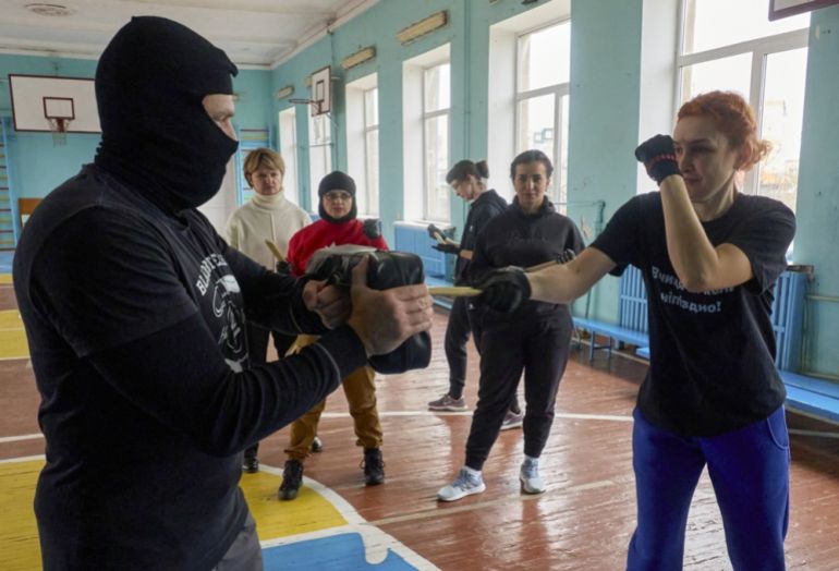  Ukrainians attend a knife-fighting training for civilians organized by the Center for Training Citizens for National Resistance in Kharkiv, northeastern Ukraine, 01 November 2025, amid the ongoing Russian invasion. Russian troops entered Ukrainian territory on 24 February 2022, starting a conflict that has provoked destruction and a humanitarian crisis. EPA/SERGEY KOZLOV