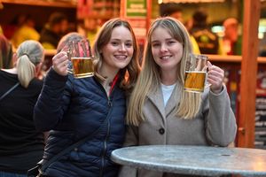 Lowri and Bethan from Aberyswyth enjoy a beer at the market