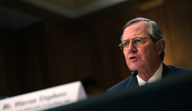 Breaking news concept with digital globe and network connections on a futuristic blue background, symbolizing global commu...