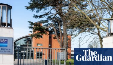 Armed police at Reading college after boy injured in assault | UK news