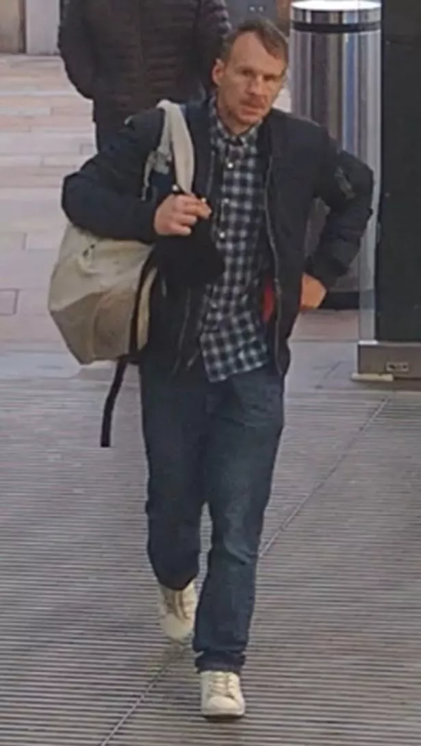 Merseyside Police has shared this image of a man they want to speak to after a rare artwork was stolen from St George's Hall