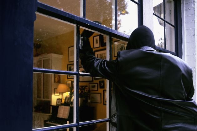 Lenaghan Crescent: Burglar broke into south Belfast home and assaulted resident and police officer