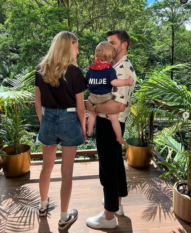 Joel and Hannah on the I'm A Celeb set with son Wylde