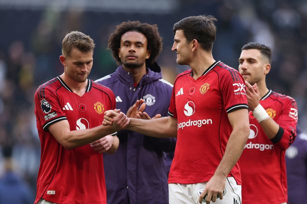 Matthijs de Ligt and Harry Maguire of Manchester United shake hands after the draw in the Premier League match between Tottenham Hotspur and Manchester United at the Tottenham Hotspur Stadium. 