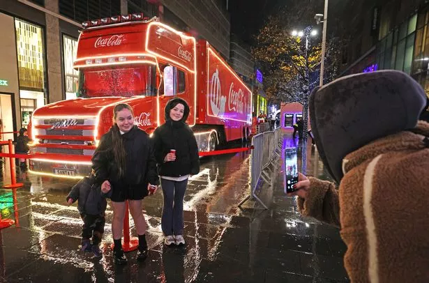 Wet night in Liverpool city centre at the Coca Cola Truck visit. 