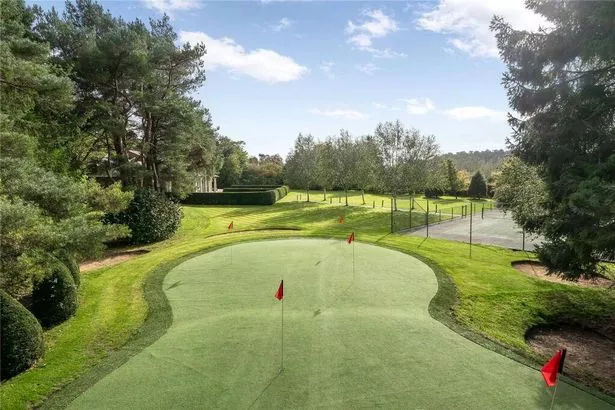 Mark Hughes' Cheshire mansion boasts a tennis court and golf green