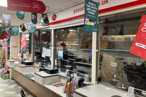 Empty desks at the closed Walton Vale Post Office.