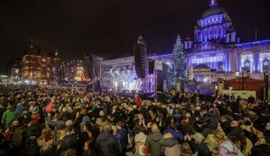 Belfast lights up for Christmas as crowds pack into City Hall for performances and festive market