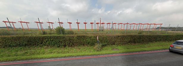 The current view from the A38 looking west towards the end of the runway at Bristol Airport. Bristol Airport wants to extend the runway closer to the A38 and move approach landing lights onto Felton Common