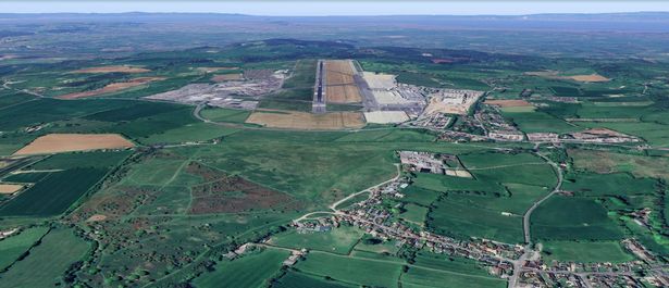 The approach to Bristol Airport from the east. the village of Winford is in the bottom right, with Felton Common in the foreground, the A38 road and then the airport runway. Bristol Airport wants to extend the runway closer to the A38 and move approach landing lights onto Felton Common