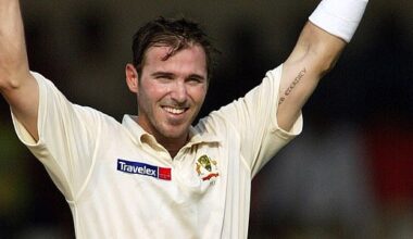 Australia's Damien Martyn raises his bat and helmet after scoring a century against India during the first day of third cricket test match in Nagpur, India, Tuesday, Oct 26, 2004. (AP Photo/Aman Sharma)