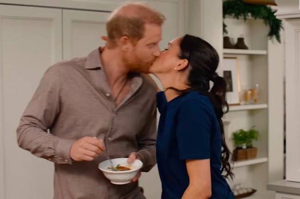 Meghan Markle and Prince Harry share a kiss