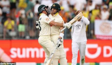 PERTH, AUSTRALIA - NOVEMBER 22: Marnus Labuschagne of Australia celebrates winning the first test with team mate Steve Smith of Australia during day two of the First 2025/26 Ashes Series Test Match between Australia and England at Perth Stadium on November 22, 2025 in Perth, Australia. (Photo by Cameron Spencer/Getty Images)