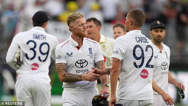 Cricket - The Ashes - Australia v England - First Test - Perth Stadium, Perth, Australia - November 22, 2025 England's Ben Stokes shakes hands with Brydon Carse after the match REUTERS/Asanka Brendon Ratnayake