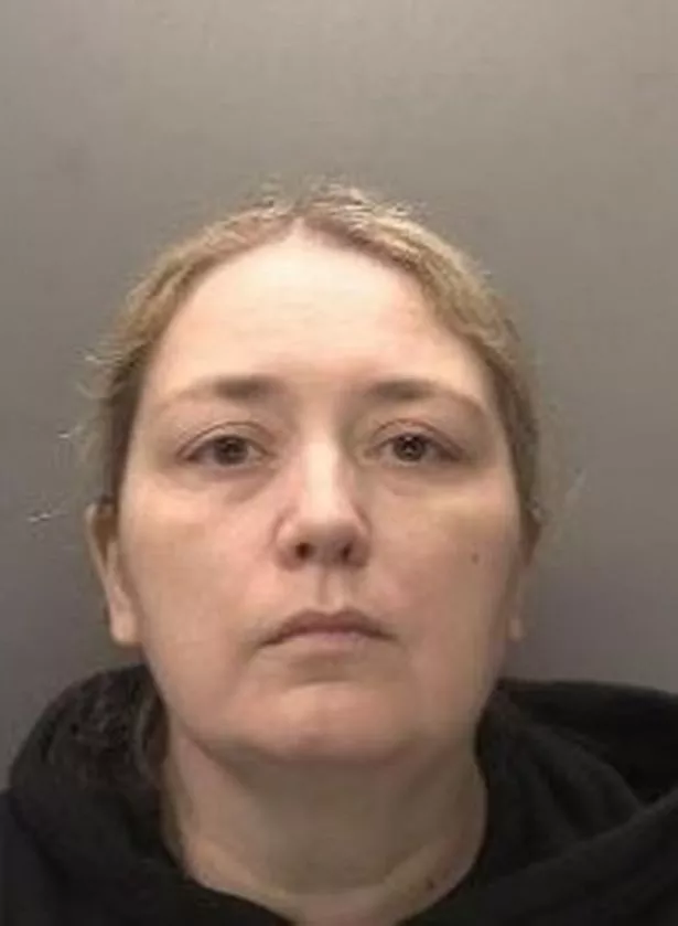 Cathleen is white, around 5 ft 8 ins tall and has long blonde hair