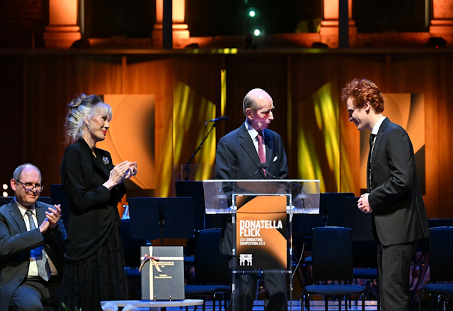 Donatella Flick and HRH The Duke of Kent announce Nicolò Foron as winner of 17th Donatella Flick Conducting Competition in 2023 © Mark Allan Donatella Flick and HRH The Duke of Kent announce Nicolò Foron as winner of 17th Donatella Flick Conducting Competition in 2023 © Mark Allan