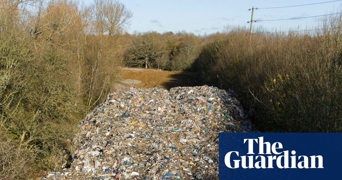 Man arrested over illegal waste ‘mountain’ by river in Oxfordshire | UK news
