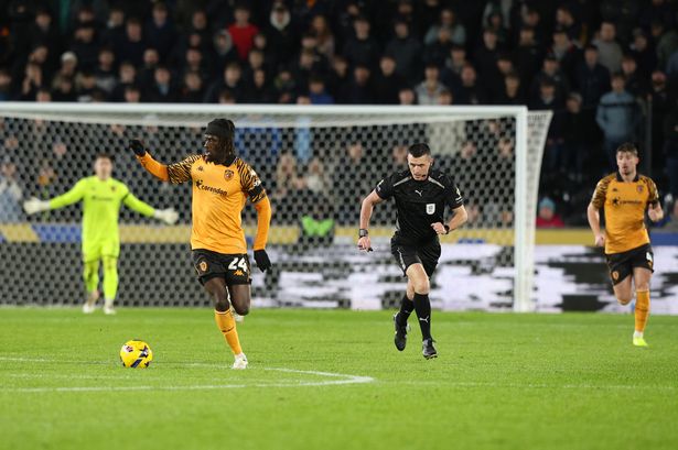 Darko Gyabi takes the ball forward for Hull City