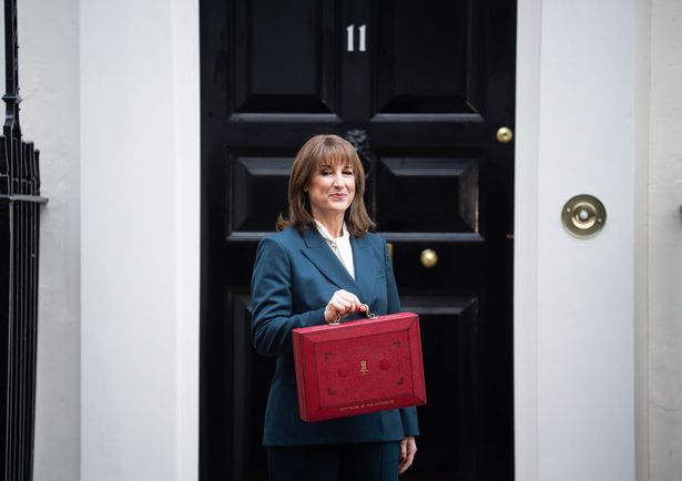 Chancellor of the Exchequer Rachel Reeves poses outside 11 Downing Street, London, with her ministerial red box, before delivering her Budget in the House of Commons. Picture date: Wednesday November 26, 2025.