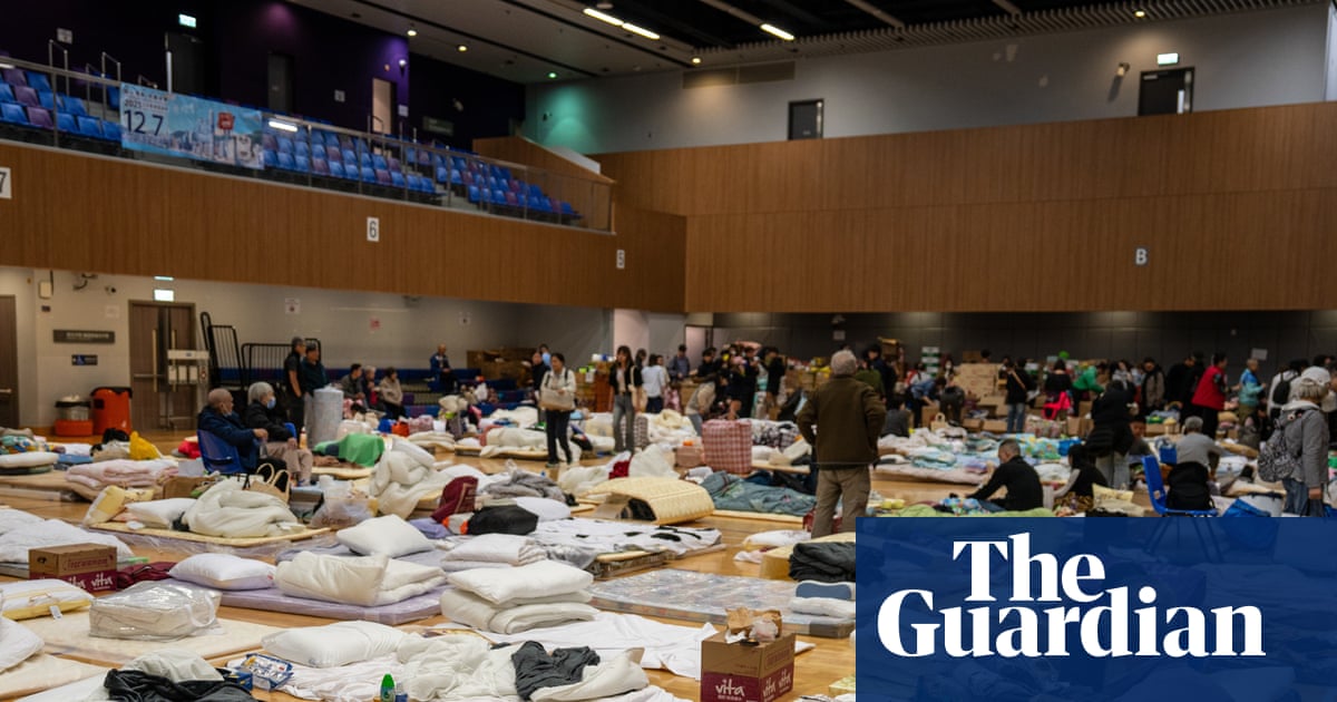 In air thick with acrid smoke, people in Hong Kong are reeling and angry | Hong Kong apartment fires