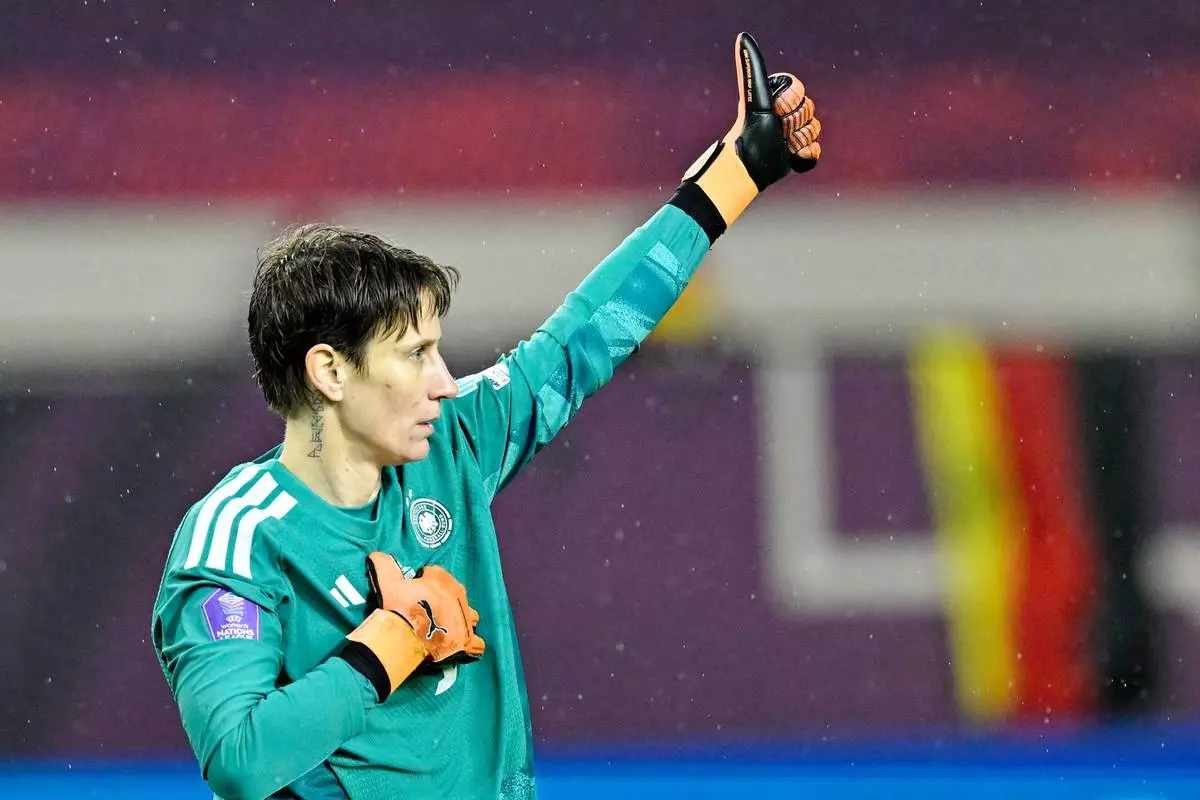 Germany's goalkeeper Ann-Katrin Berger reacts during the women's nations league soccer match between Germany and Spain in Kaiserslautern, Germany, Friday Nov. 28, 2025. (Uwe Anspach/dpa via AP)