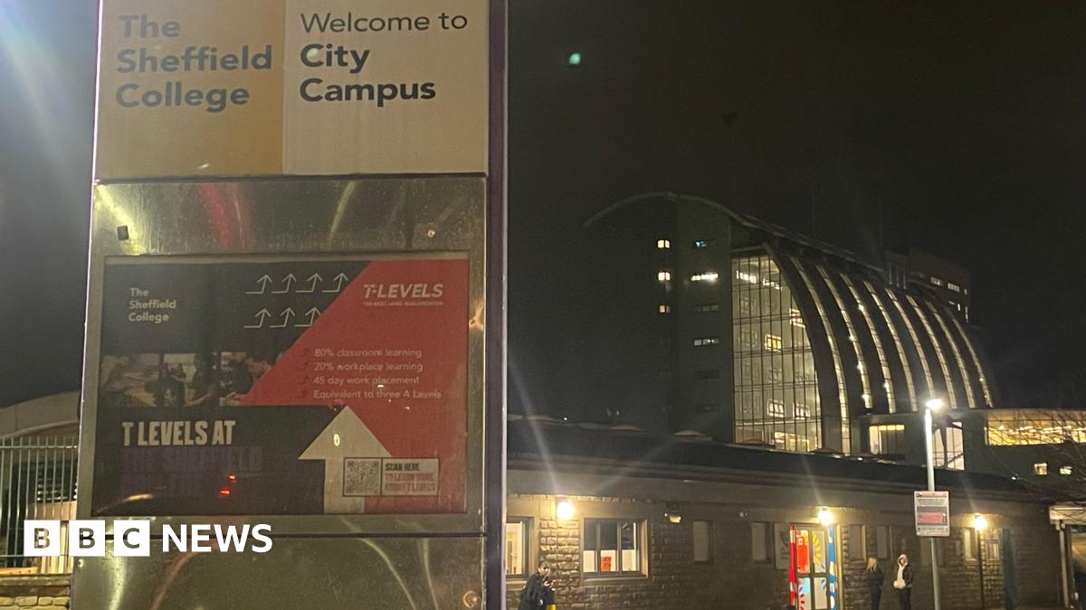 Exterior shot of Sheffield City College, with signs saying City Campus, and stone, glass and steel buildings behind.