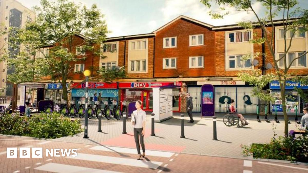 Visualisation of how the proposed road safety measures for Vauxhall and Duddeston in Birmingham would look  - showing a modernised street with local shops and bollards in place, with a zebra crossing