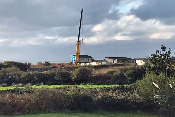 A lodge being lifted into position on the Silver Bay Holiday Park in 2018