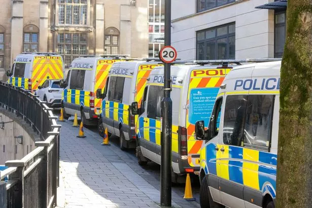 Police vans lined up behind College Green as Avon and Somerset Police prepare for a Defend Our Juries mass arrest protest on Saturday, November 29