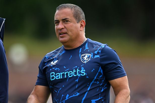 Adam Hollioake, Head Coach of Kent Spitfires (R)looks on during the Vitality Blast Men match between Somerset and Kent Spitfires at The Cooper Associates County Ground on June 15, 2025 in Taunton, England.