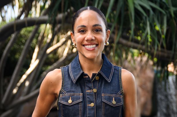 Alex Scott poses at the hotel after being evicted from I'm A Celebrity