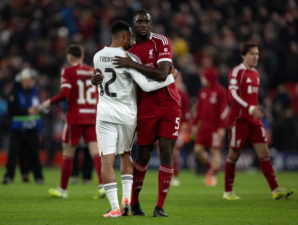 Trent Alexander-Arnold of Real Madrid embraces Ibrahima Konate of Liverpool following the UEFA Champions League 2025/26 League Phase MD4 match between Liverpool FC and Real Madrid C.F. at Anfield on November 4, 2025 in Liverpool, England