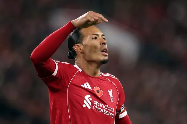 Virgil van Dijk of Liverpool shouts instructions during the Premier League match between Liverpool and Aston Villa
