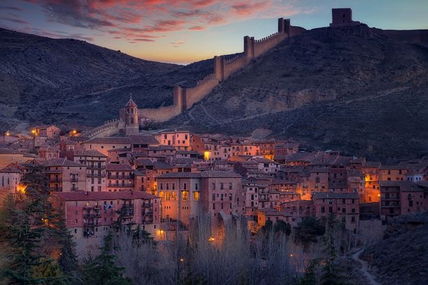view of Albarracín taken from the hill in front of the town. In the background the church of Santiago and the medieval city wall. 