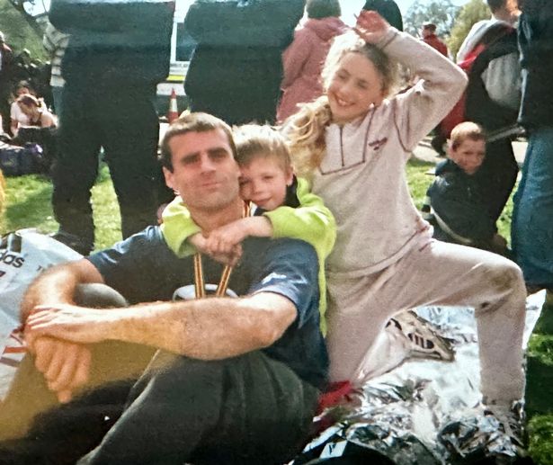 Mark with his children