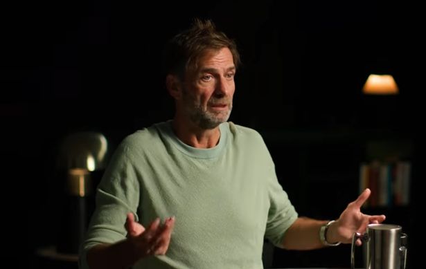 Jurgen Klopp with his arms out speaking in an interview