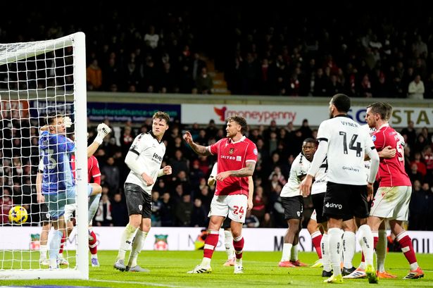 Bristol City goalkeeper Radek Vitek (left) scores an own goal, Wrexham's second goal of the game, during the Sky Bet Championship match at the SToK Cae Ras, Wrexham. Picture date: Wednesday November 26, 2025. PA Photo. Photo credit should read: Nick Potts/PA Wire.
